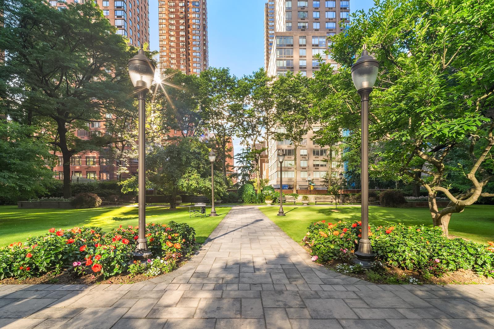 30 West 60th Street, Unit 10S Manhattan, NY 10019 - Photo 8 of 15 a view of a park with large trees