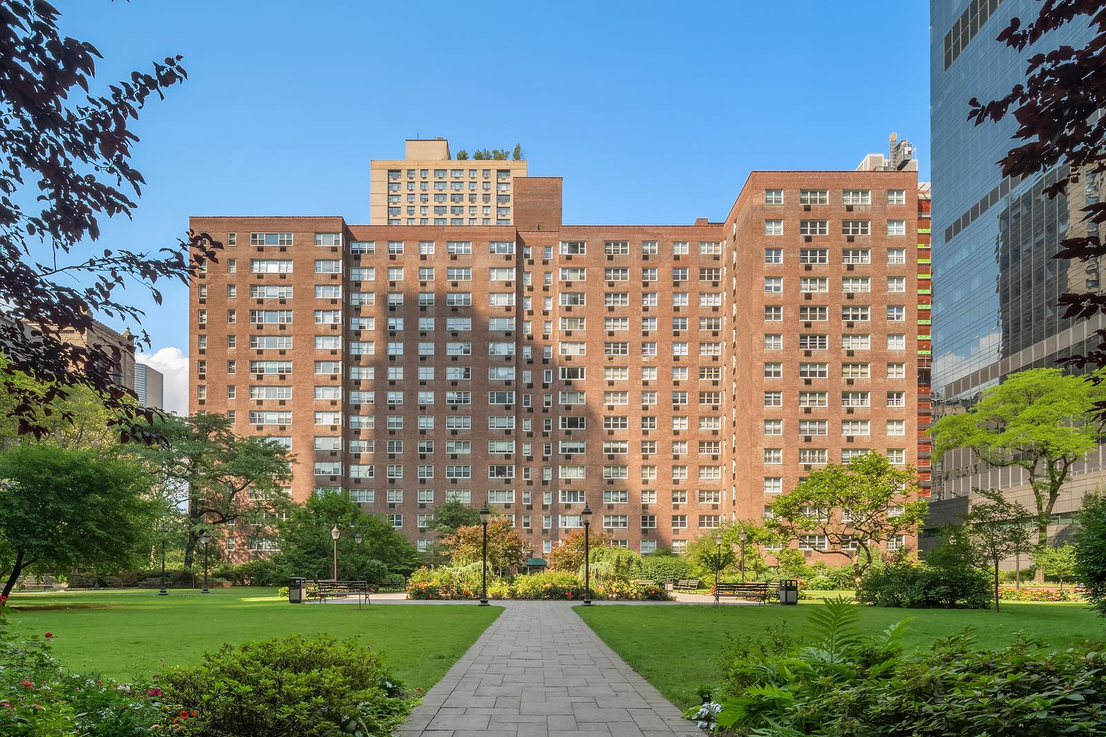 30 West 60th Street, Unit 10S Manhattan, NY 10019 - Photo 9 of 15 a view of a building with a yard