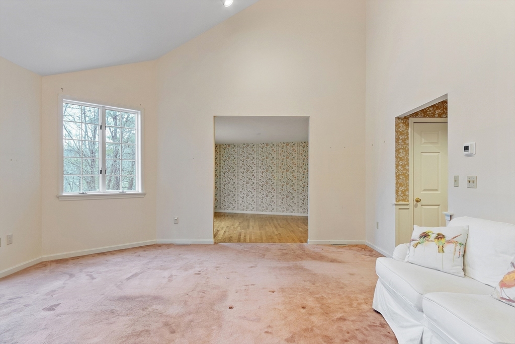4004 Brompton Circle, Unit 4004 Worcester, MA 01609 - Photo 16 of 36 a bedroom with a bed and a couch
