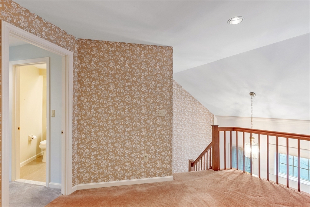 4004 Brompton Circle, Unit 4004 Worcester, MA 01609 - Photo 18 of 36 a view of a hallway with wooden floor and entryway