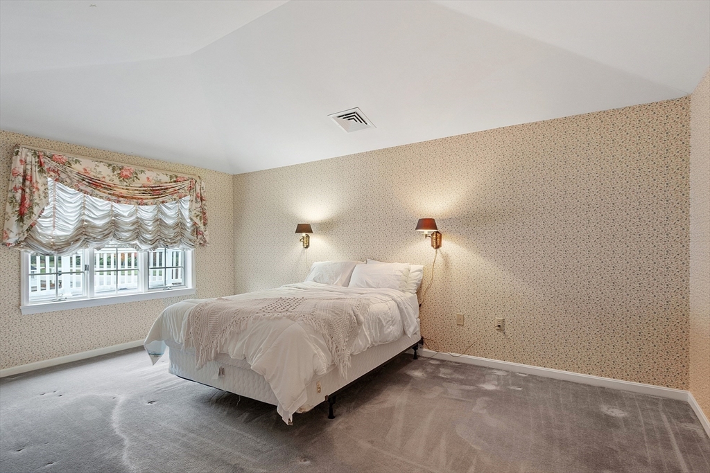 4004 Brompton Circle, Unit 4004 Worcester, MA 01609 - Photo 22 of 36 a bedroom with a bed and a window