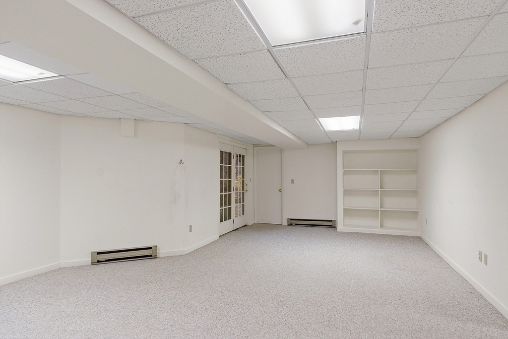 4004 Brompton Circle, Unit 4004 Worcester, MA 01609 - Photo 30 of 36 an empty room with a empty space and empty shelves