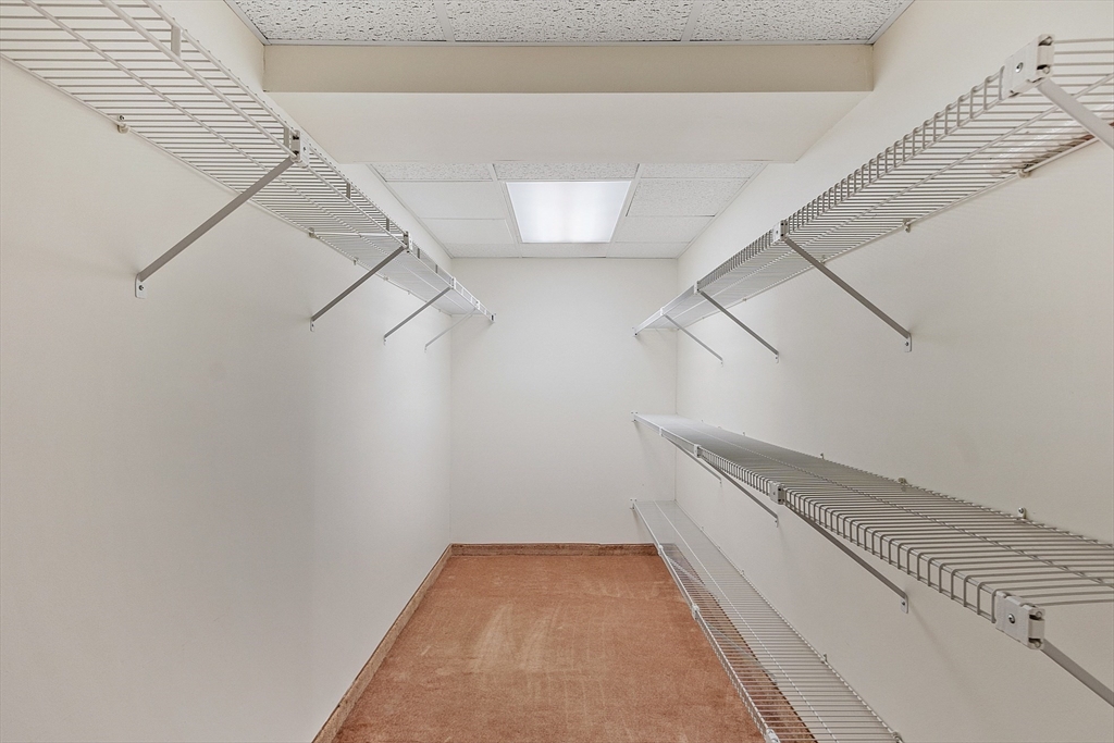 4004 Brompton Circle, Unit 4004 Worcester, MA 01609 - Photo 33 of 36 a view of a room with racks on the wall