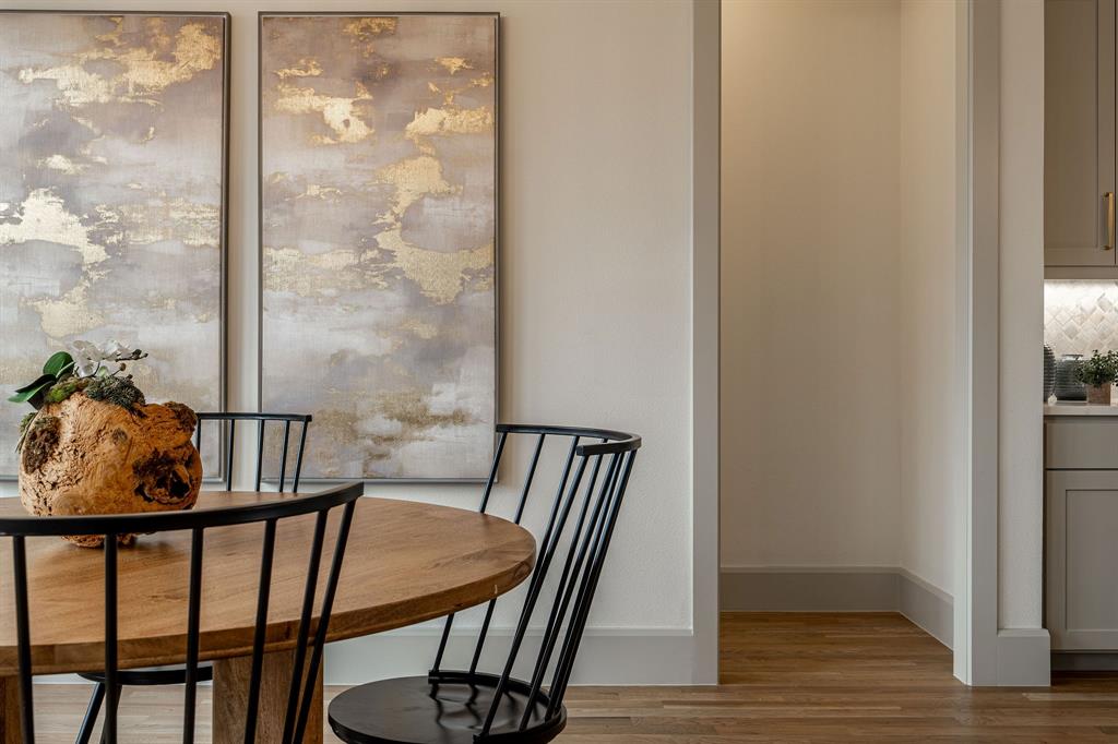 317 Travis Street Roanoke, TX 76262 - Photo 6 of 38 a view of a balcony with furniture and wooden floor