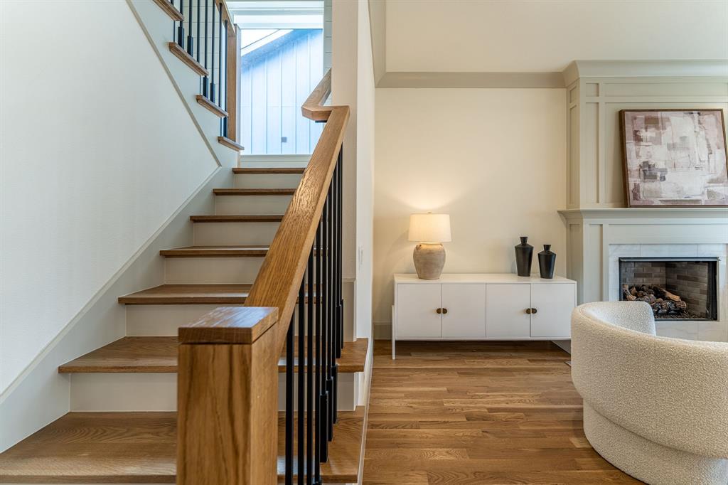 317 Travis Street Roanoke, TX 76262 - Photo 9 of 38 a view of living room with furniture and fireplace