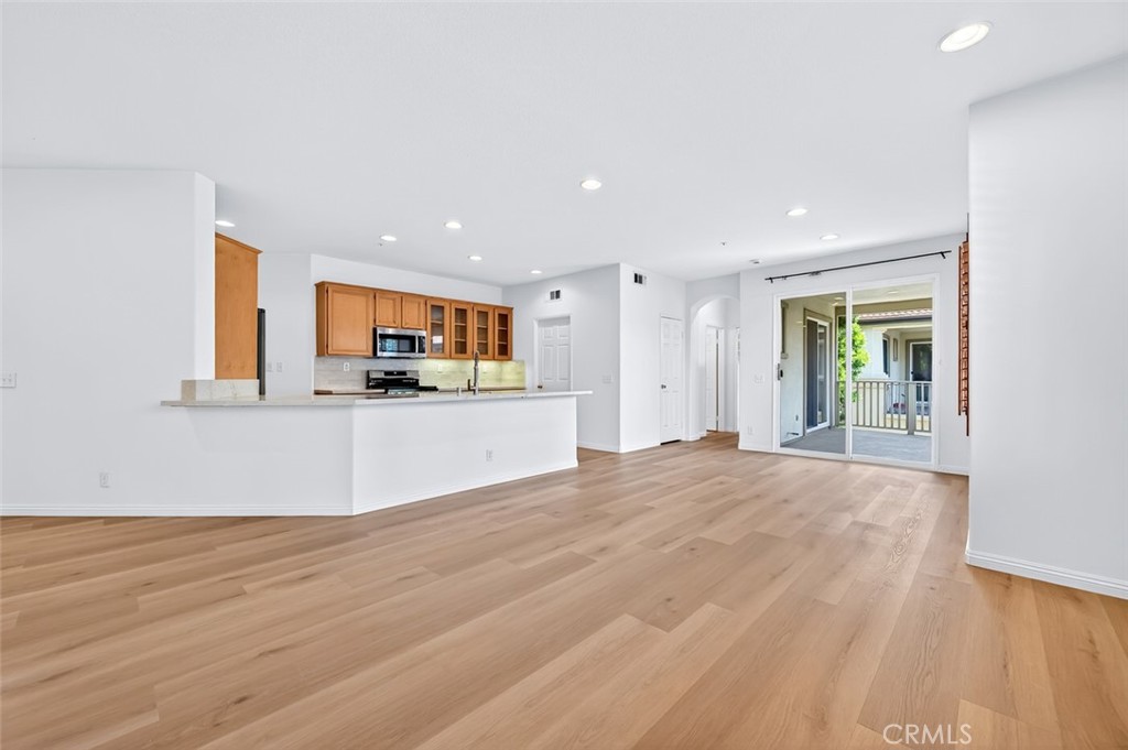 447 Ridgeway Irvine, CA 92620 - Photo 16 of 88 a view of a kitchen with a sink and a large window
