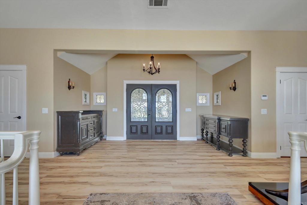 36485 Carney Road Valley Center, CA 92082 - Photo 11 of 75 a front view of a house with a fireplace