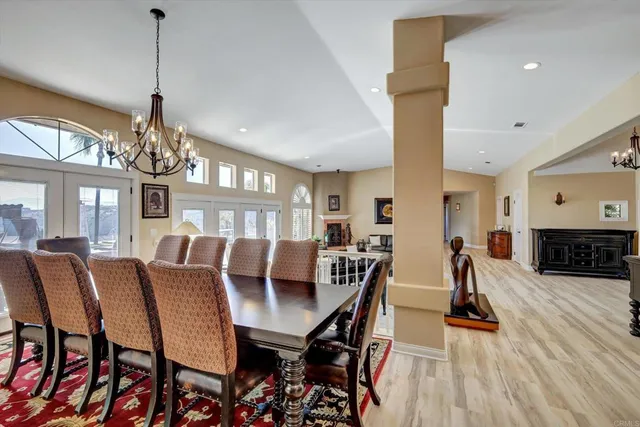 a kitchen with a sink appliances and cabinets