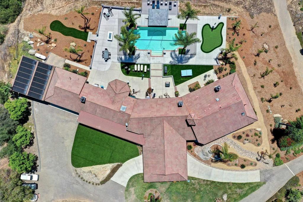 36485 Carney Road Valley Center, CA 92082 - Photo 2 of 75 an aerial view of a house with a garden and fire pit