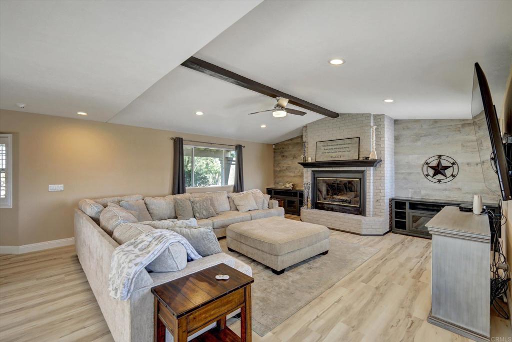 36485 Carney Road Valley Center, CA 92082 - Photo 26 of 75 a living room with furniture and a fireplace