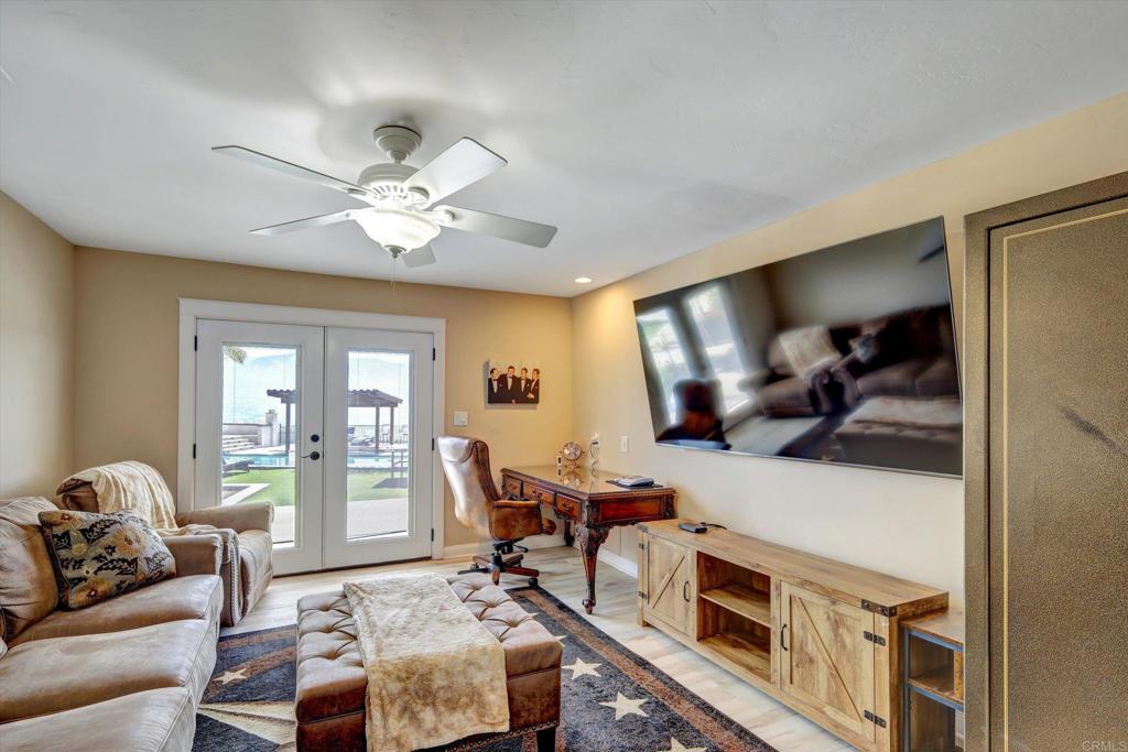 36485 Carney Road Valley Center, CA 92082 - Photo 37 of 75 a living room with furniture and a chandelier