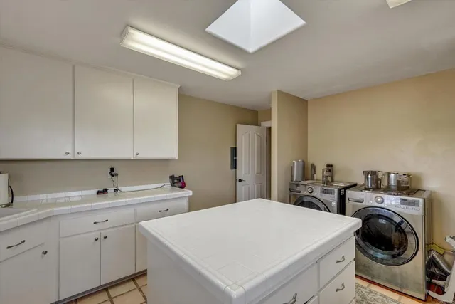 an aerial view of a house with a garden