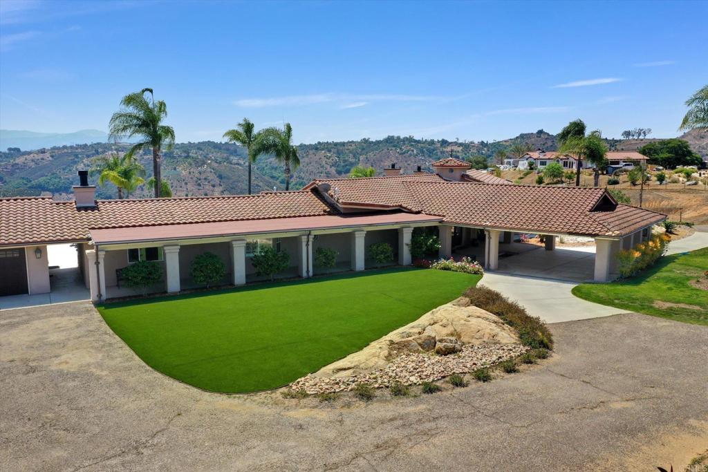 36485 Carney Road Valley Center, CA 92082 - Photo 58 of 75 a view of a house with a garden
