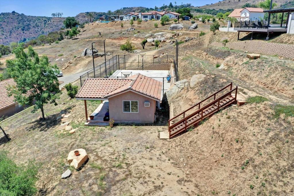 36485 Carney Road Valley Center, CA 92082 - Photo 71 of 75 an aerial view of a house with a yard