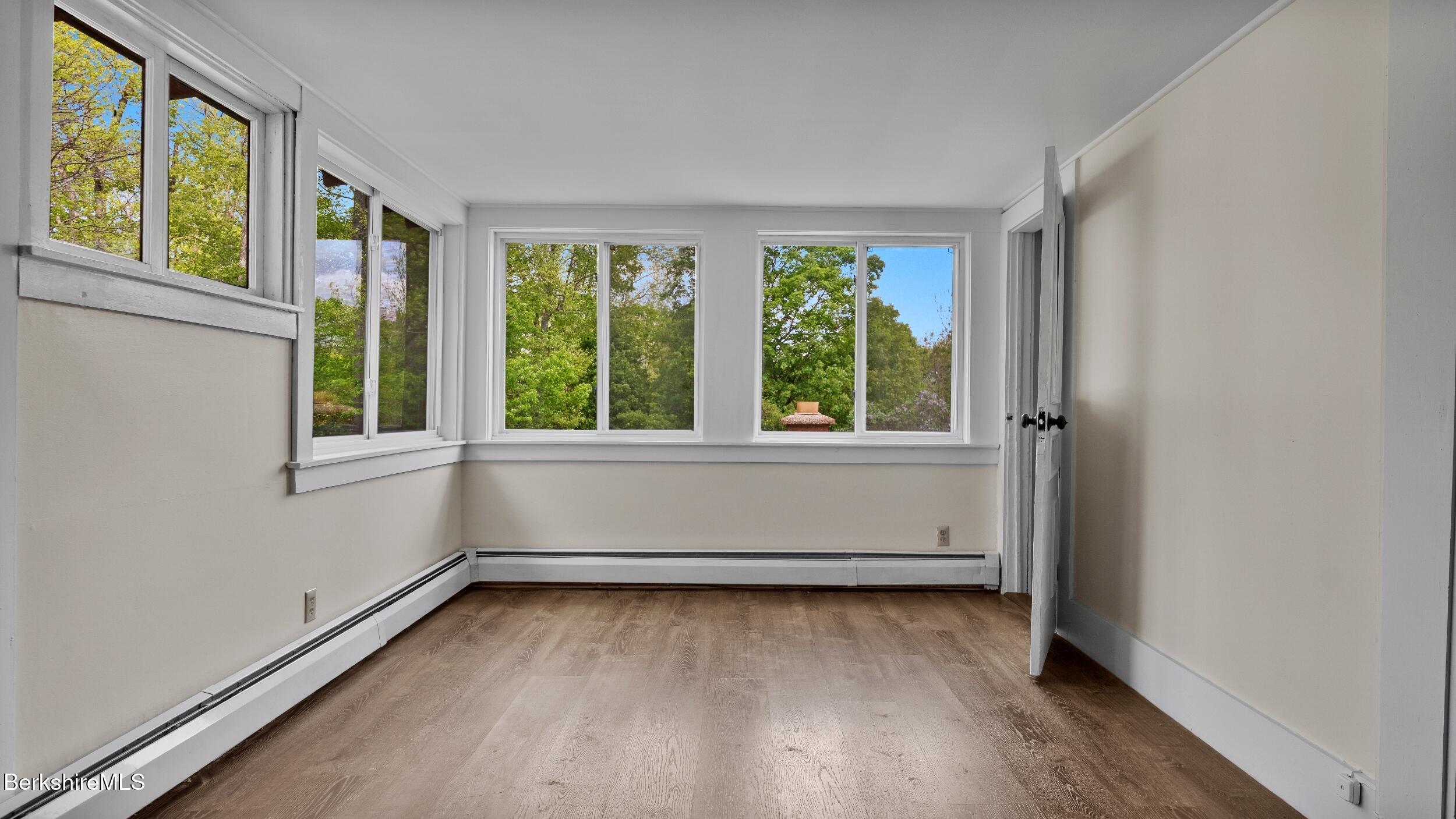 20 East Dugway Road Lenox, MA 01240 - Photo 32 of 84 a view of room with window and hardwood floor