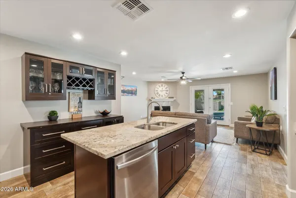 a kitchen with a stove and cabinets