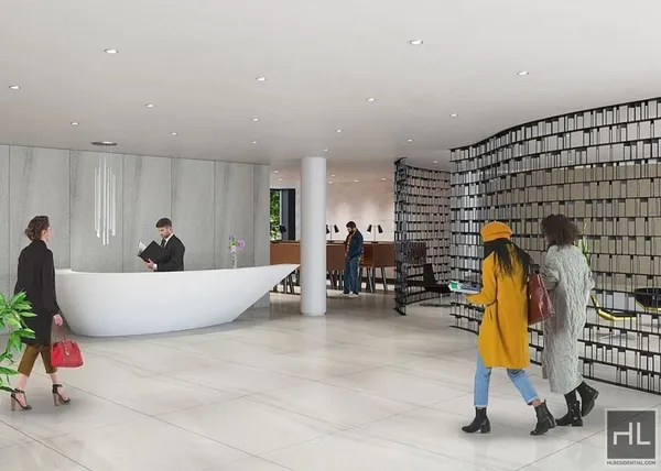 a living room with furniture and gym equipment