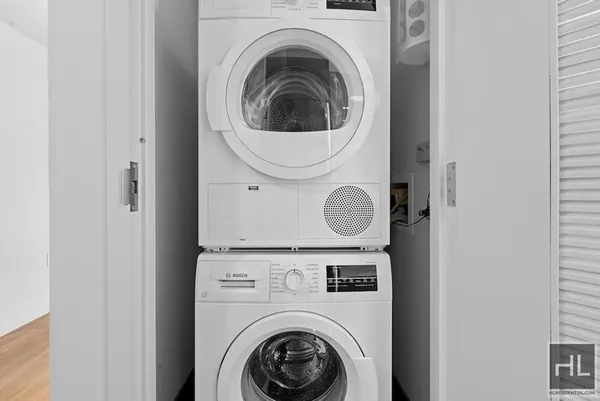 a utility room with dryer and washer
