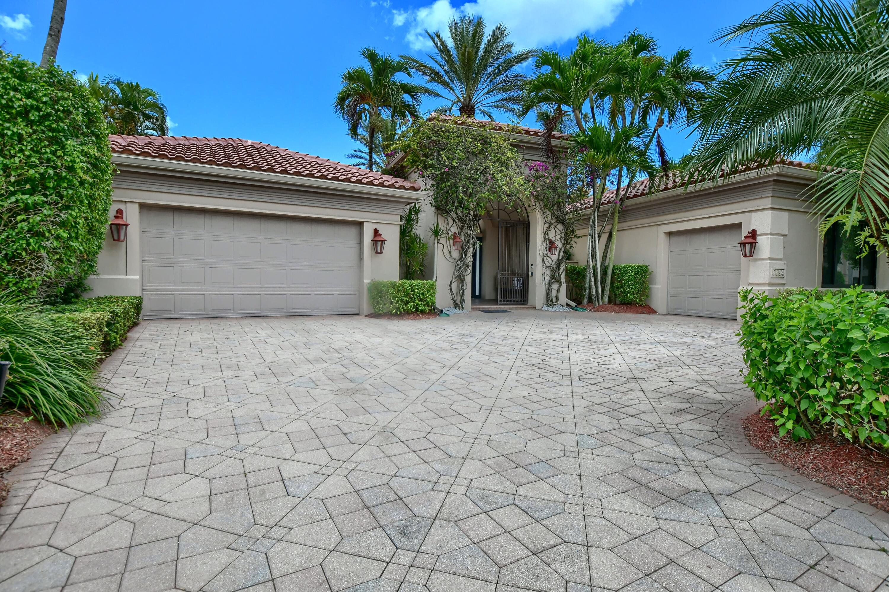 5894 Northwest 25th Court Boca Raton, FL 33496 - Photo 3 of 46 driveway