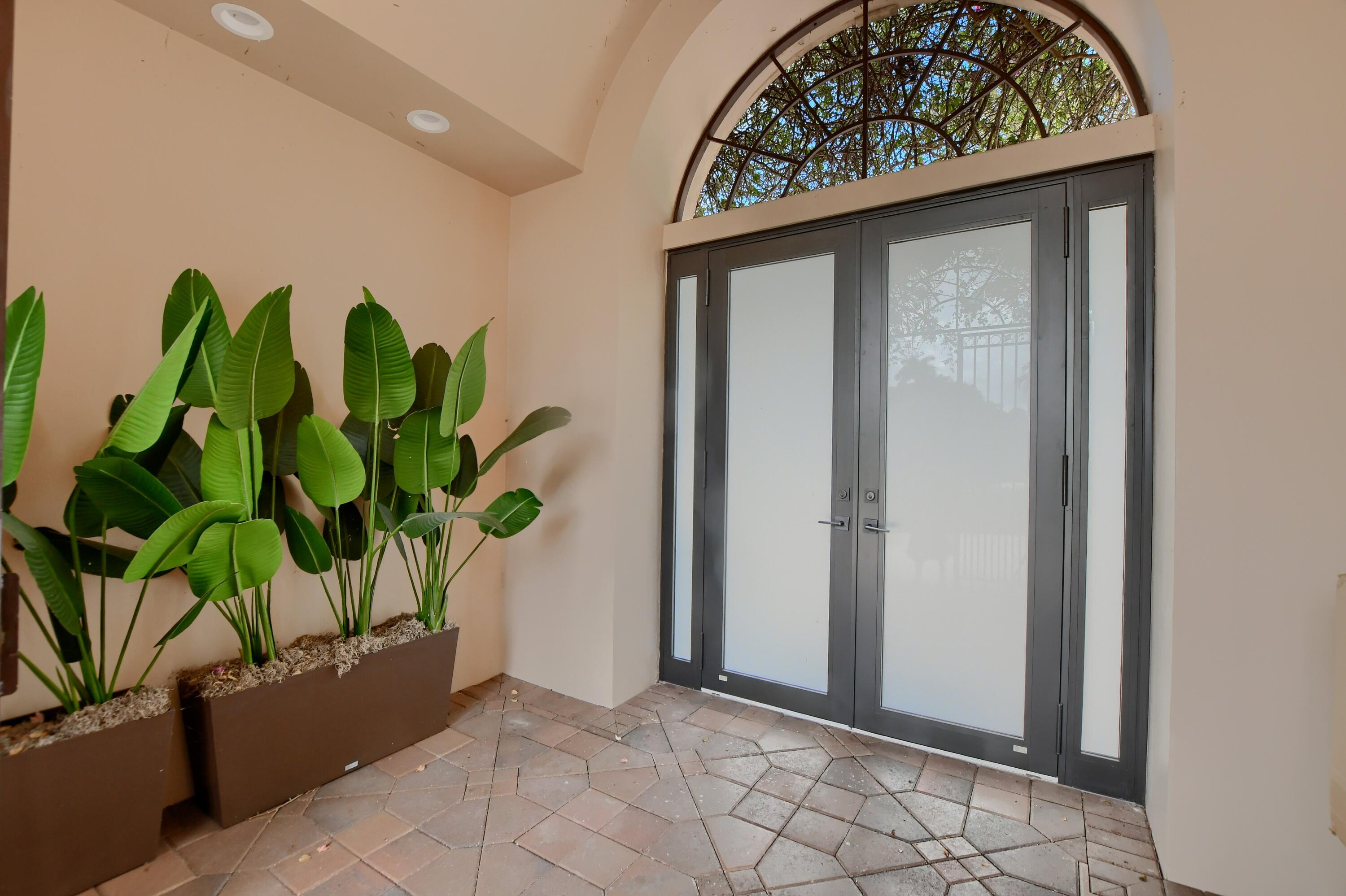 5894 Northwest 25th Court Boca Raton, FL 33496 - Photo 4 of 46 front gate entry