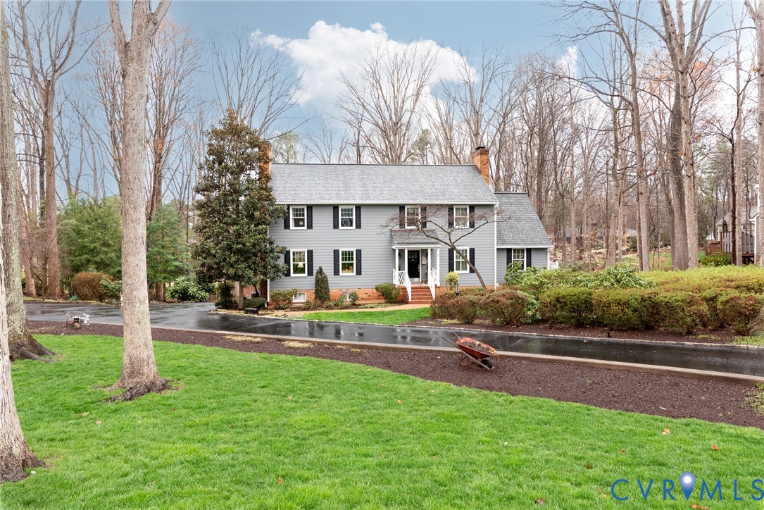 11920 Rothbury Drive Richmond, VA 23236 - Photo 2 of 68 a house view with swimming pool and garden