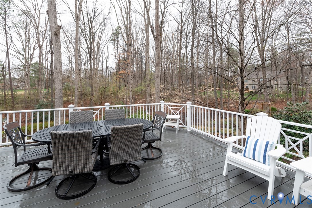 11920 Rothbury Drive Richmond, VA 23236 - Photo 46 of 68 a view of a chair and table on the wooden floor
