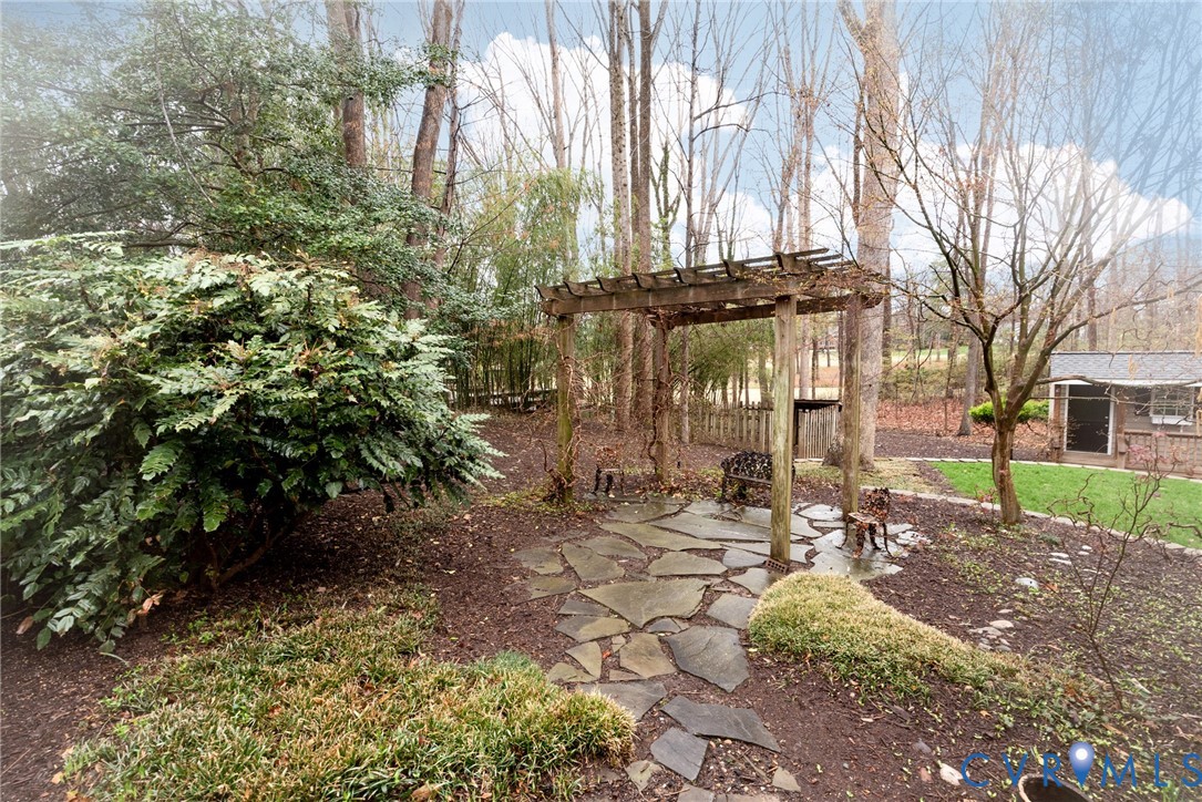 11920 Rothbury Drive Richmond, VA 23236 - Photo 50 of 68 a view of a pathway with a yard