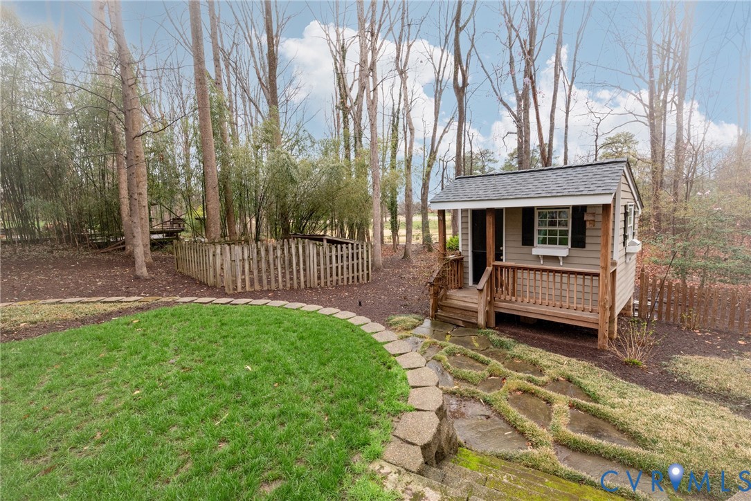 11920 Rothbury Drive Richmond, VA 23236 - Photo 51 of 68 a view of a house with a yard and sitting area