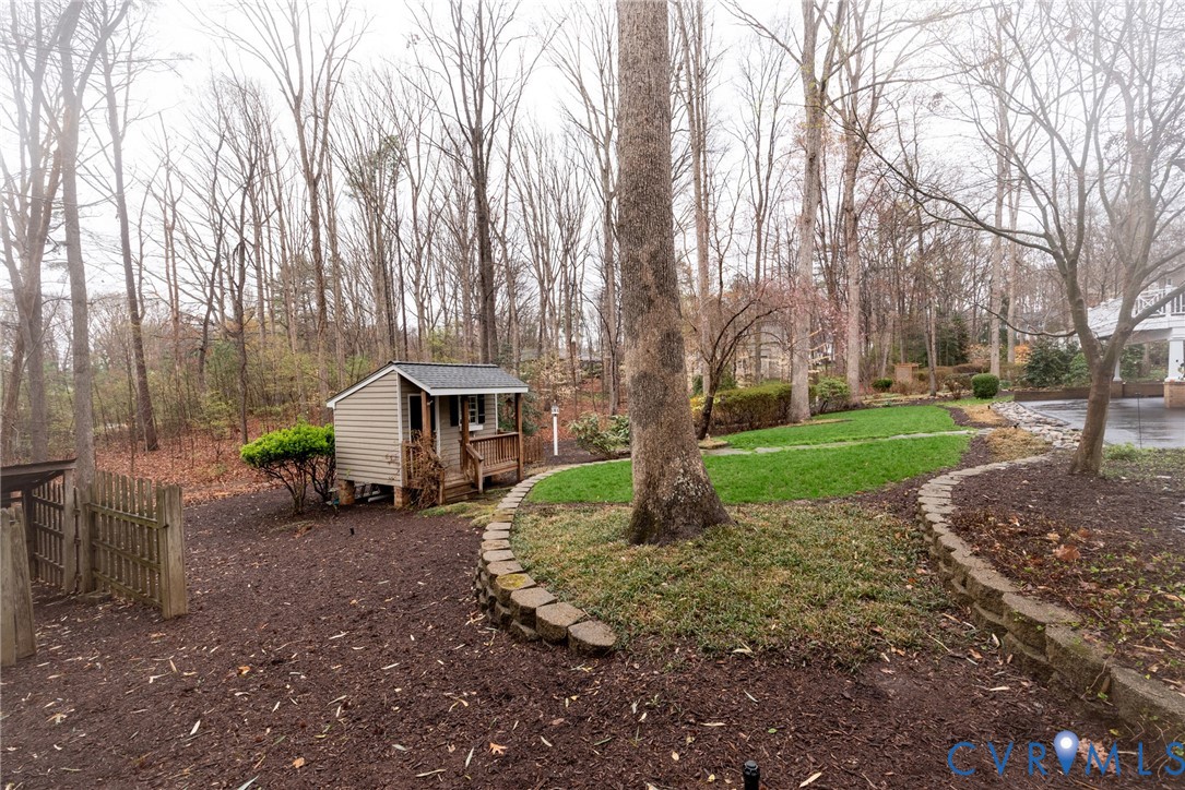 11920 Rothbury Drive Richmond, VA 23236 - Photo 53 of 68 a view of a house with a yard and tree s