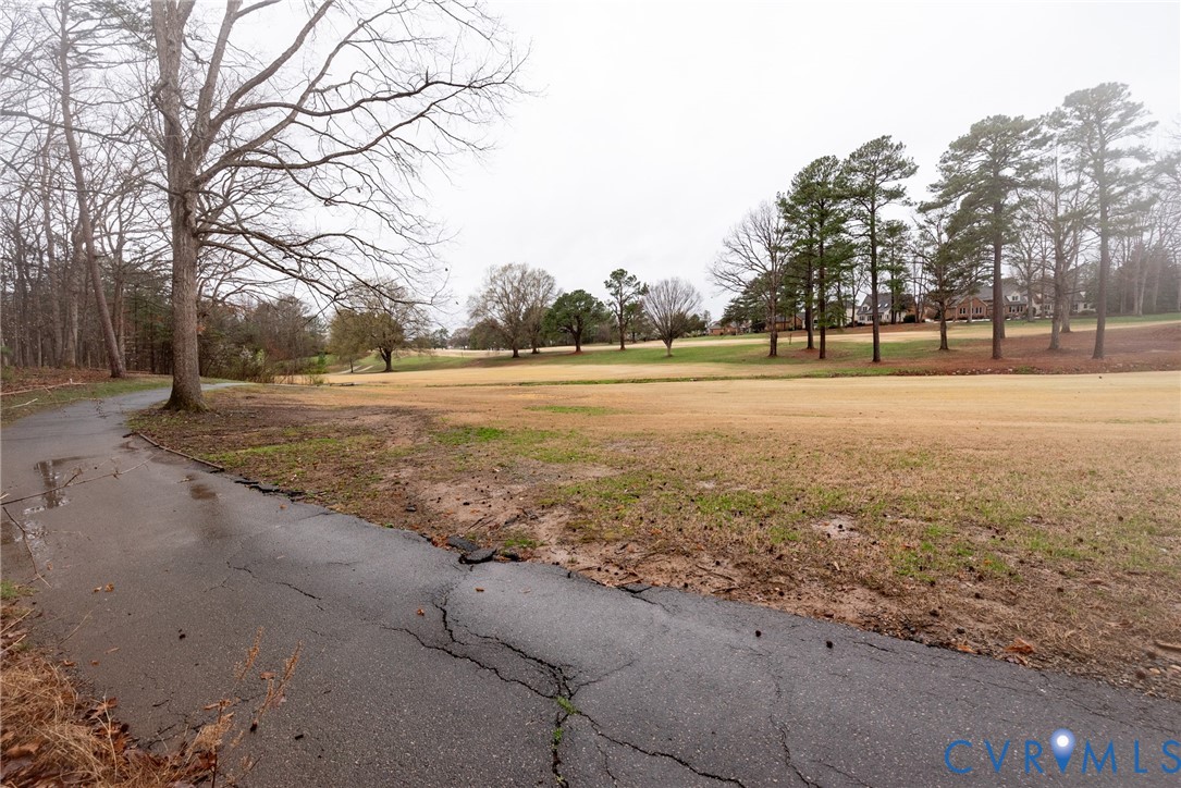 11920 Rothbury Drive Richmond, VA 23236 - Photo 57 of 68 a view of a field with trees in the background