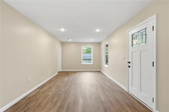 a view of kitchen with wooden floor