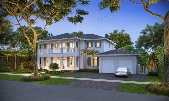 a front view of a house with a yard and trees