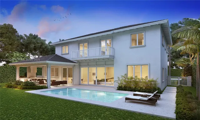 a backyard of a house with table and chairs