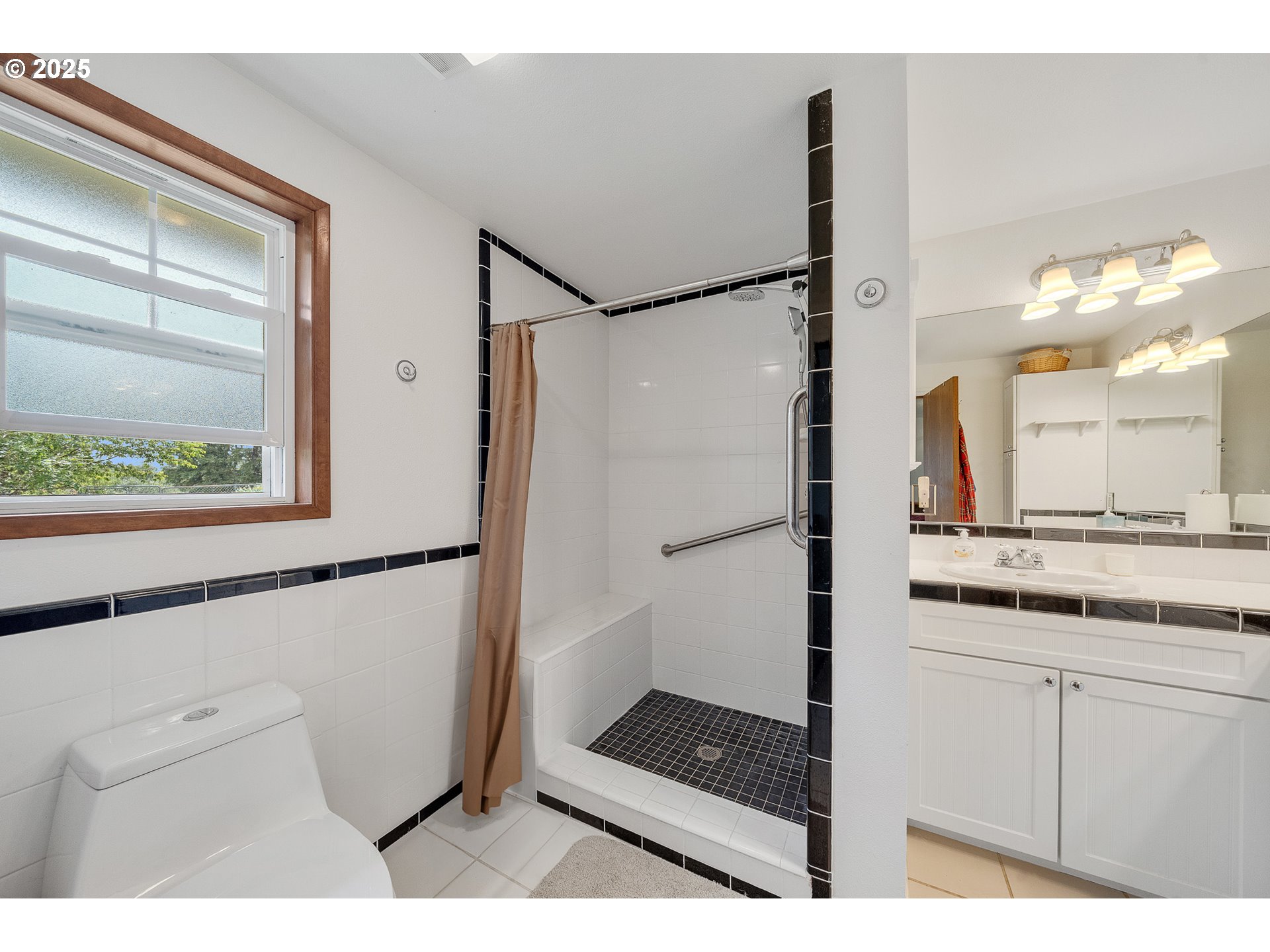9065 Trask River Road Tillamook, OR 97141 - Photo 13 of 48 a bathroom with a sink and a mirror
