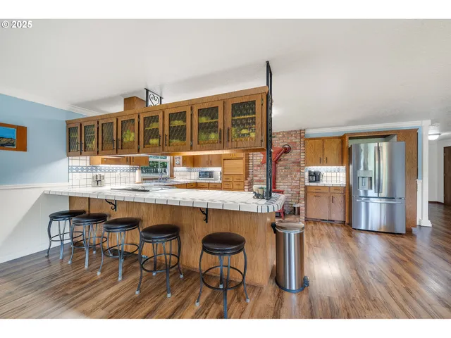 a dinning table and chairs in the kitchen