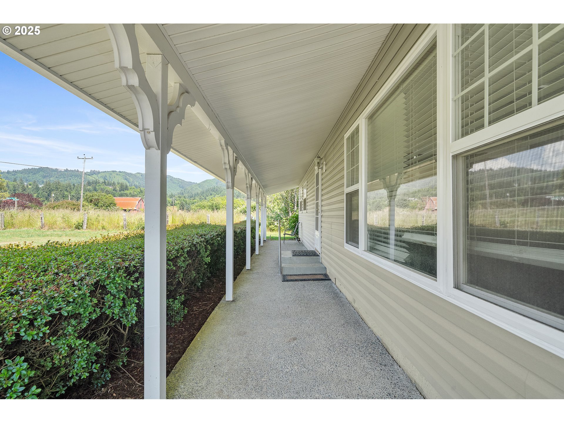 9065 Trask River Road Tillamook, OR 97141 - Photo 32 of 48 a view of a city from a balcony