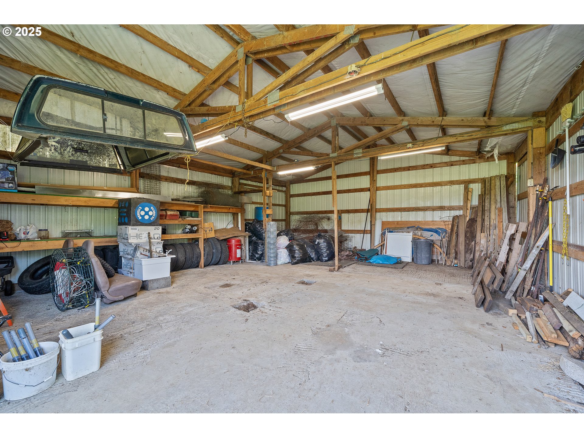 9065 Trask River Road Tillamook, OR 97141 - Photo 38 of 48 a view of a garage with storage