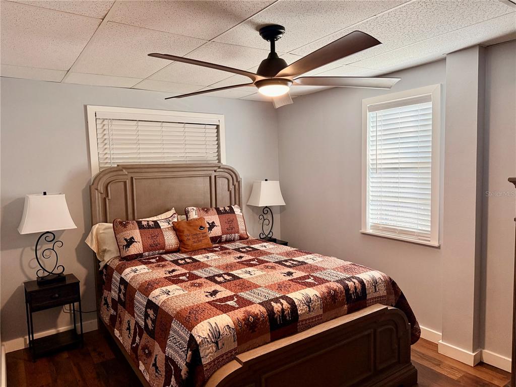 61 Perch Street Haines City, FL 33844 - Photo 21 of 79 a bedroom with a bed and window