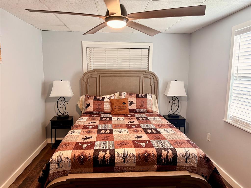 61 Perch Street Haines City, FL 33844 - Photo 22 of 79 a bedroom with bed and window