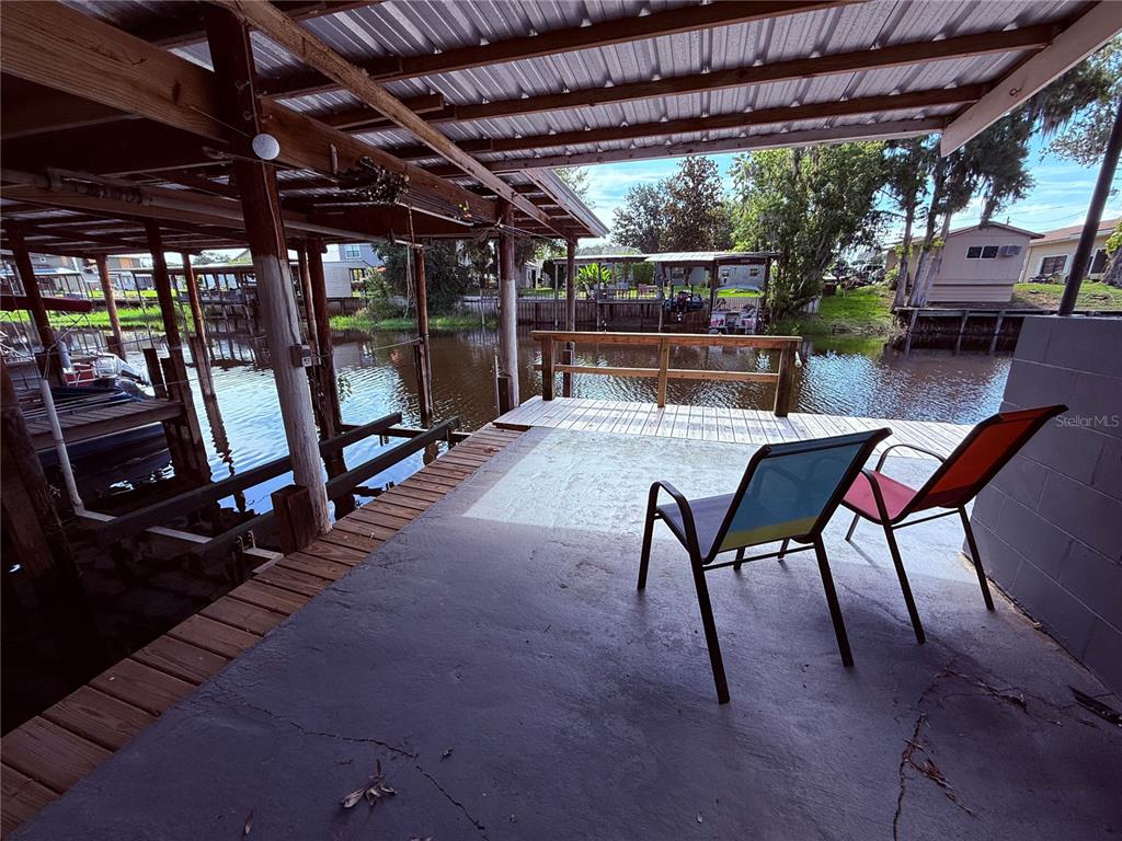 61 Perch Street Haines City, FL 33844 - Photo 42 of 79 a view of a patio with table and chairs
