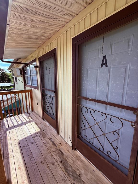 61 Perch Street Haines City, FL 33844 - Photo 56 of 79 a view of a balcony with wooden floor