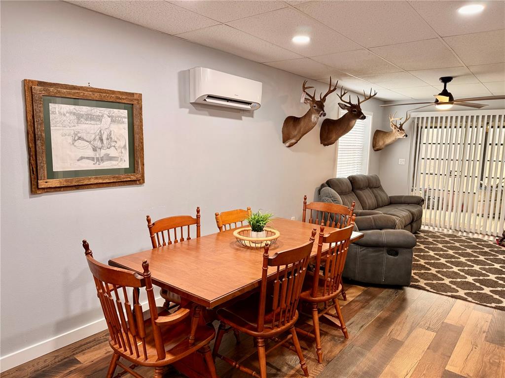 61 Perch Street Haines City, FL 33844 - Photo 10 of 79 a dining room with furniture and window