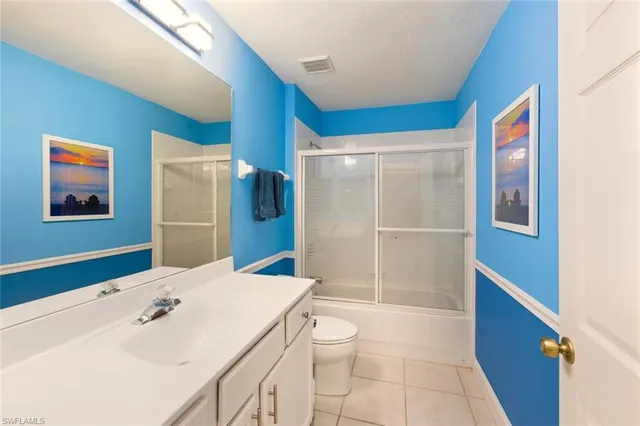 a view of storage and utility room with washer and dryer