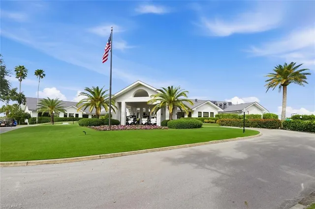 a lobby with furniture and a fireplace