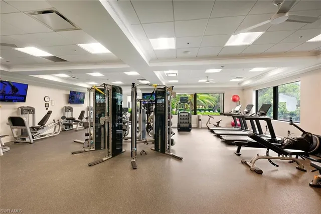 a view of a patio with couches chairs and a yard