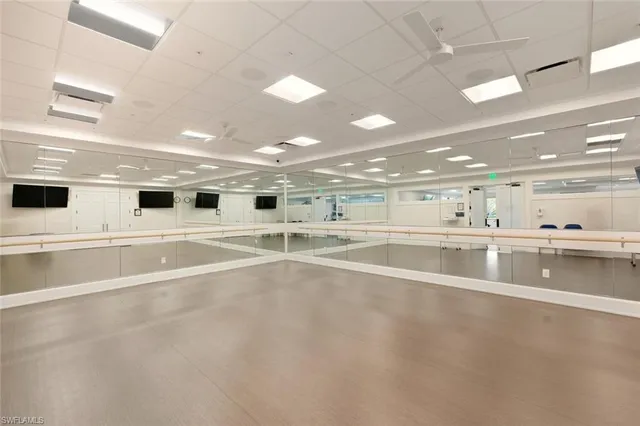 a view of a park with large trees