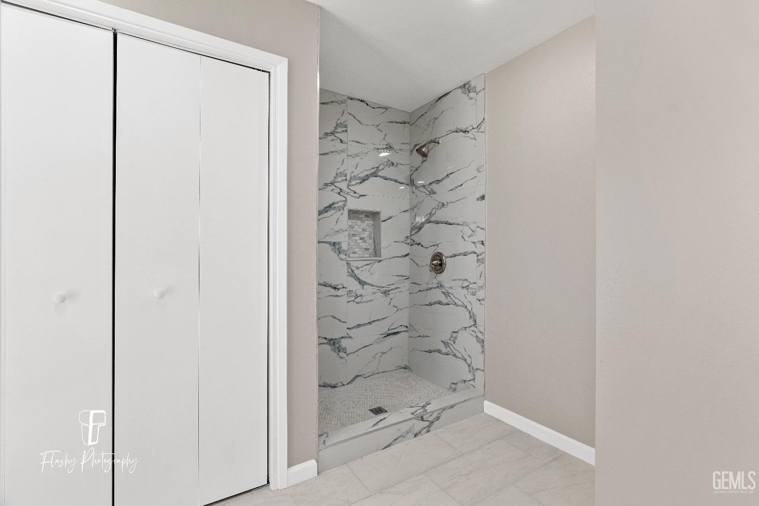 Undisclosed Address Bakersfield, CA 93308 - Photo 27 of 37 a bathroom with a shower