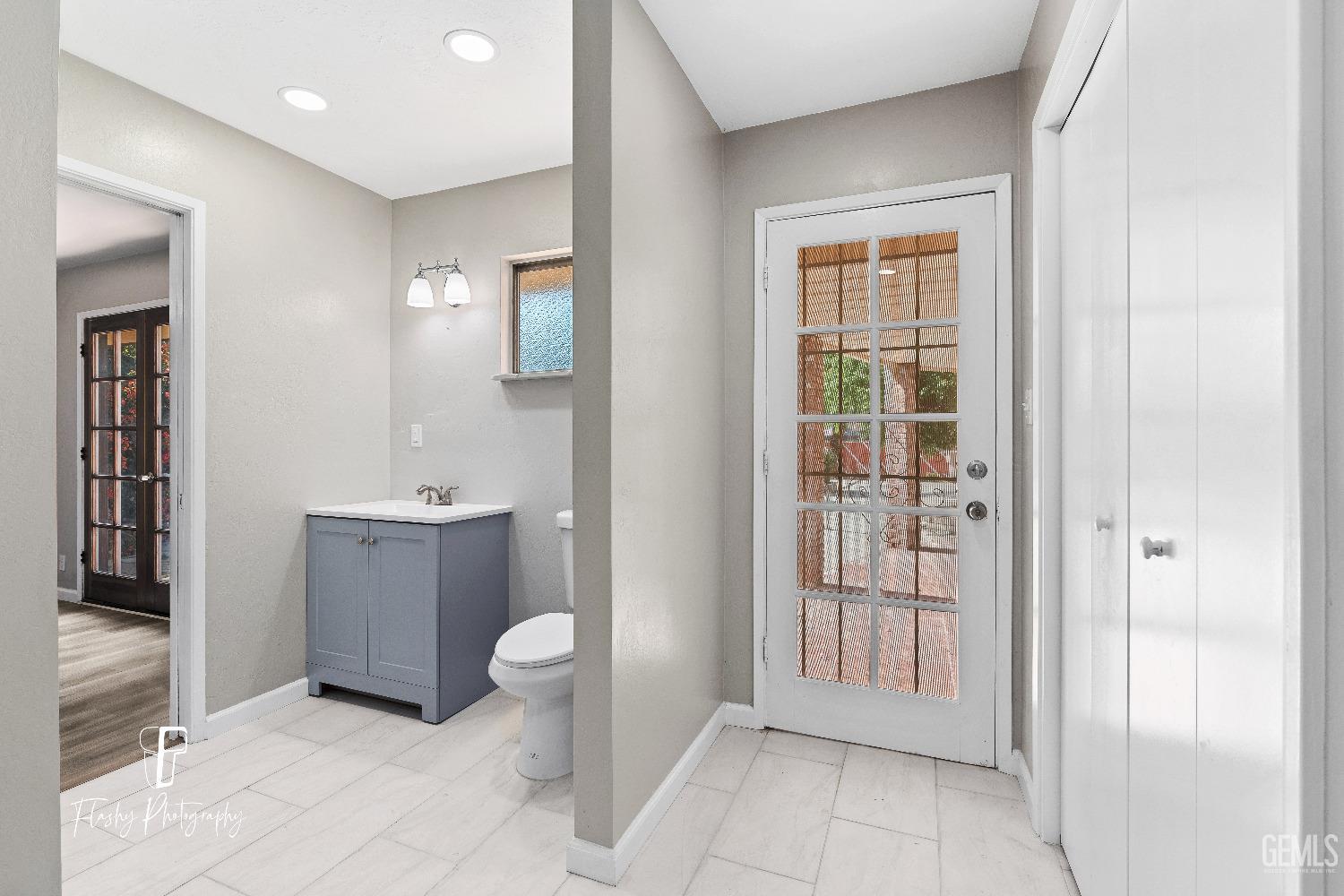 Undisclosed Address Bakersfield, CA 93308 - Photo 28 of 37 a bathroom with a toilet sink and shower