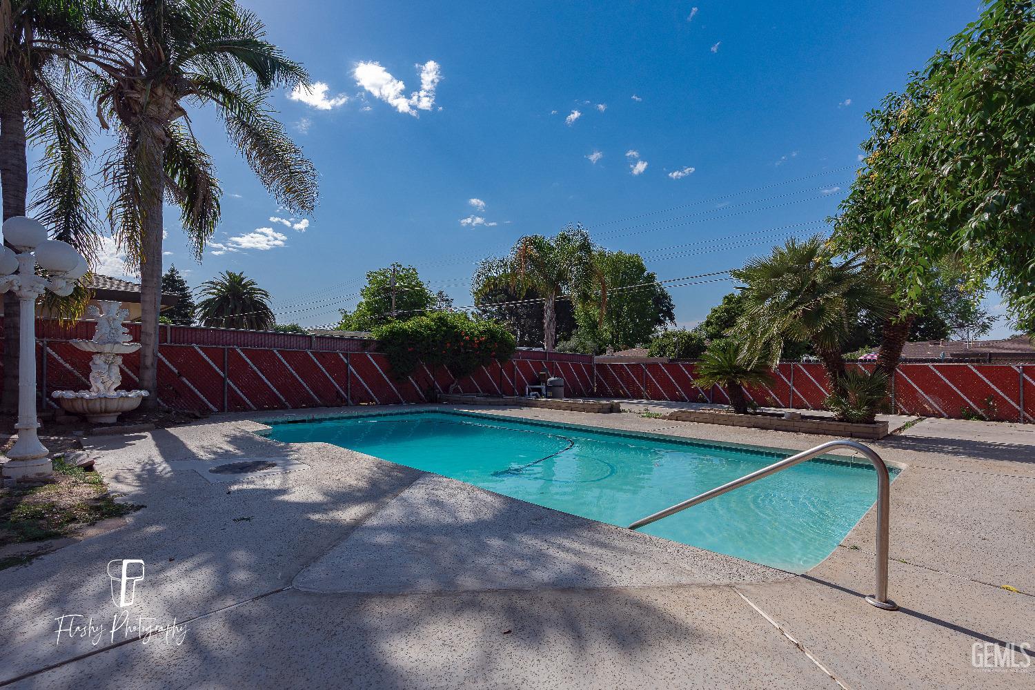 Undisclosed Address Bakersfield, CA 93308 - Photo 31 of 37 a view of a backyard with swimming pool
