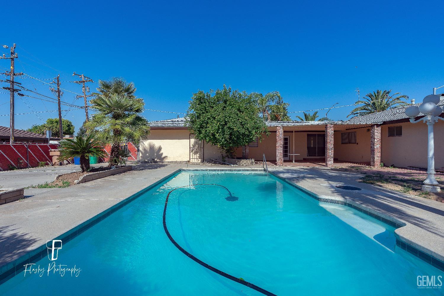 Undisclosed Address Bakersfield, CA 93308 - Photo 33 of 37 a view of a house with swimming pool
